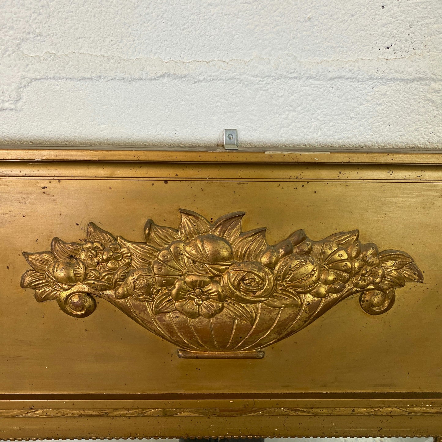 Grand miroir trumeau biseauté doré