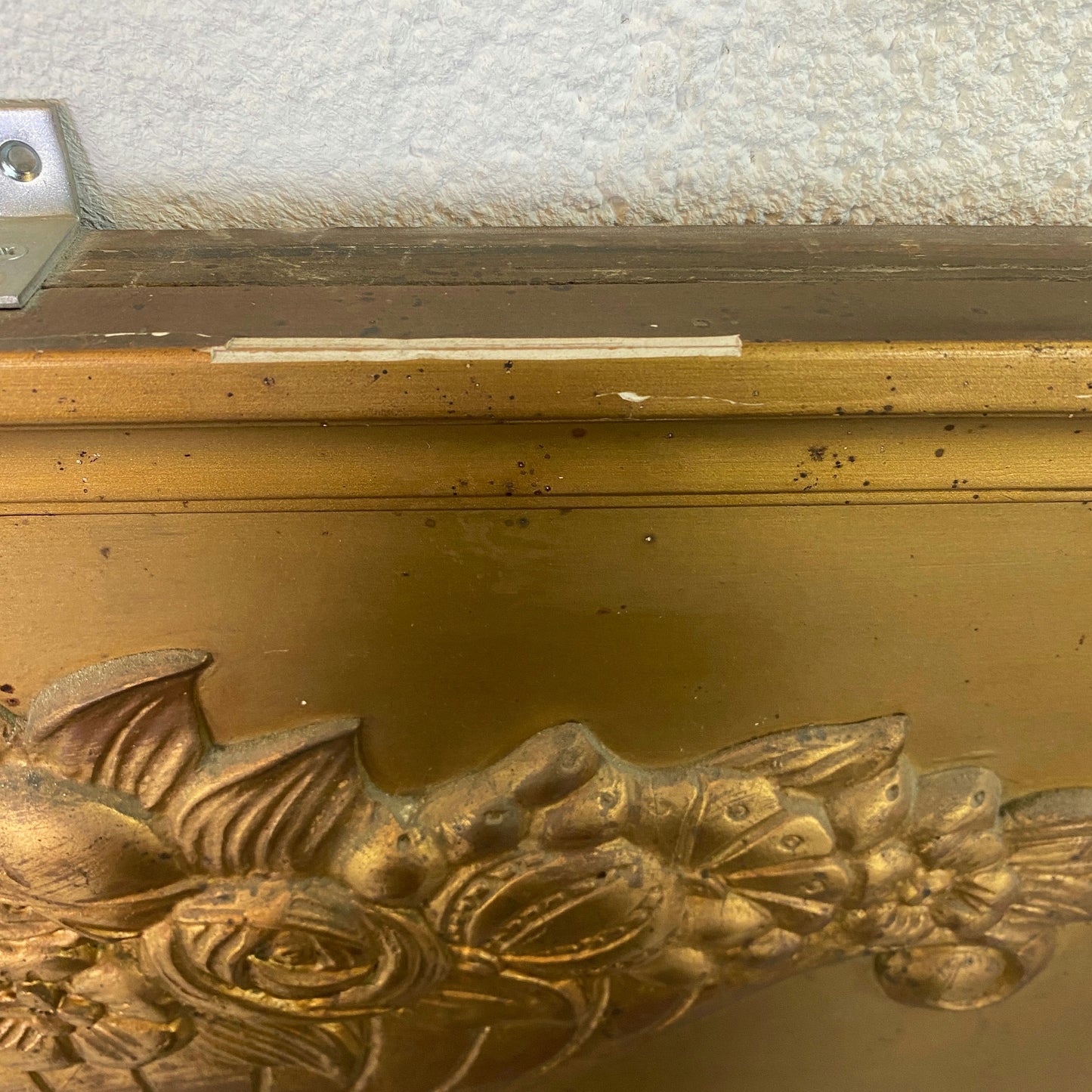 Grand miroir trumeau biseauté doré