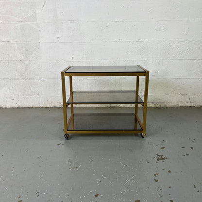 Étagère à roulettes et plateaux en verre