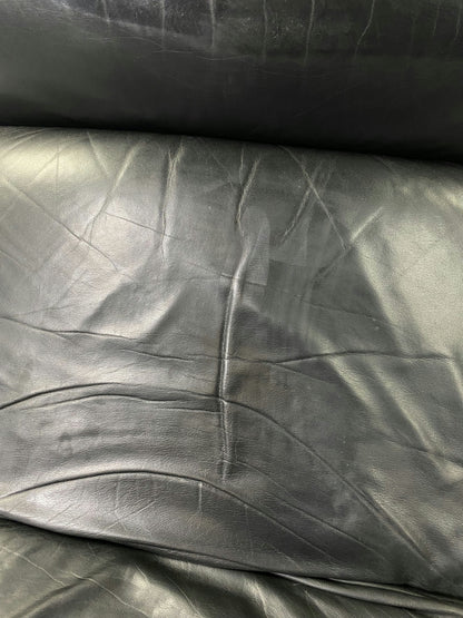 Fauteuil noir en cuir Knoll