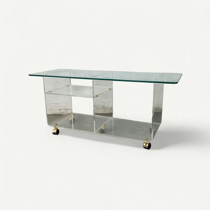 Grande table basse en verre à roulette