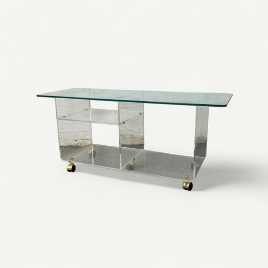 Grande table basse en verre à roulette
