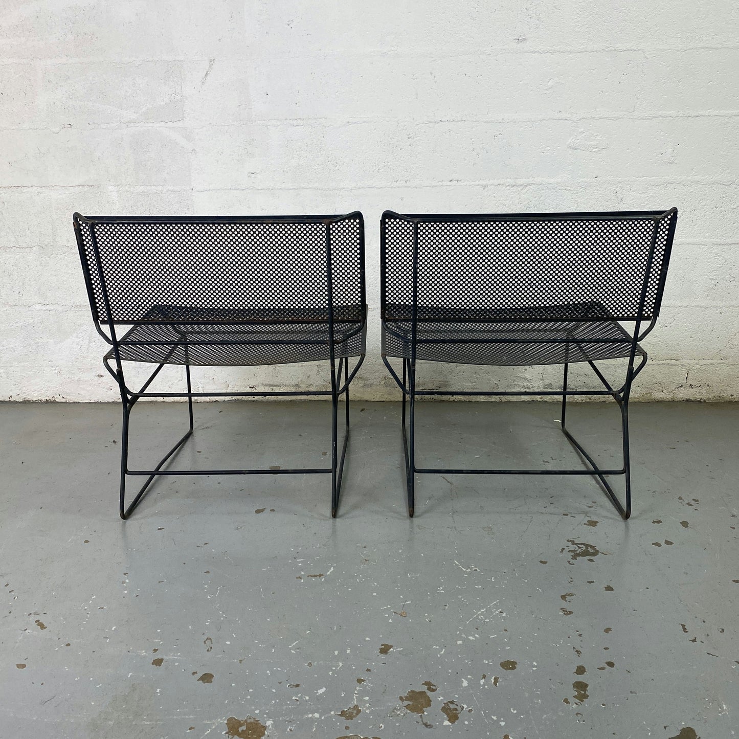 Paire de fauteuils en métal perforé collection fil par François Azambourg