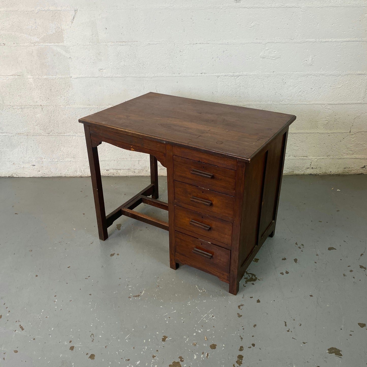 Bureau en bois 4 tiroirs