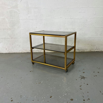 Étagère à roulettes et plateaux en verre