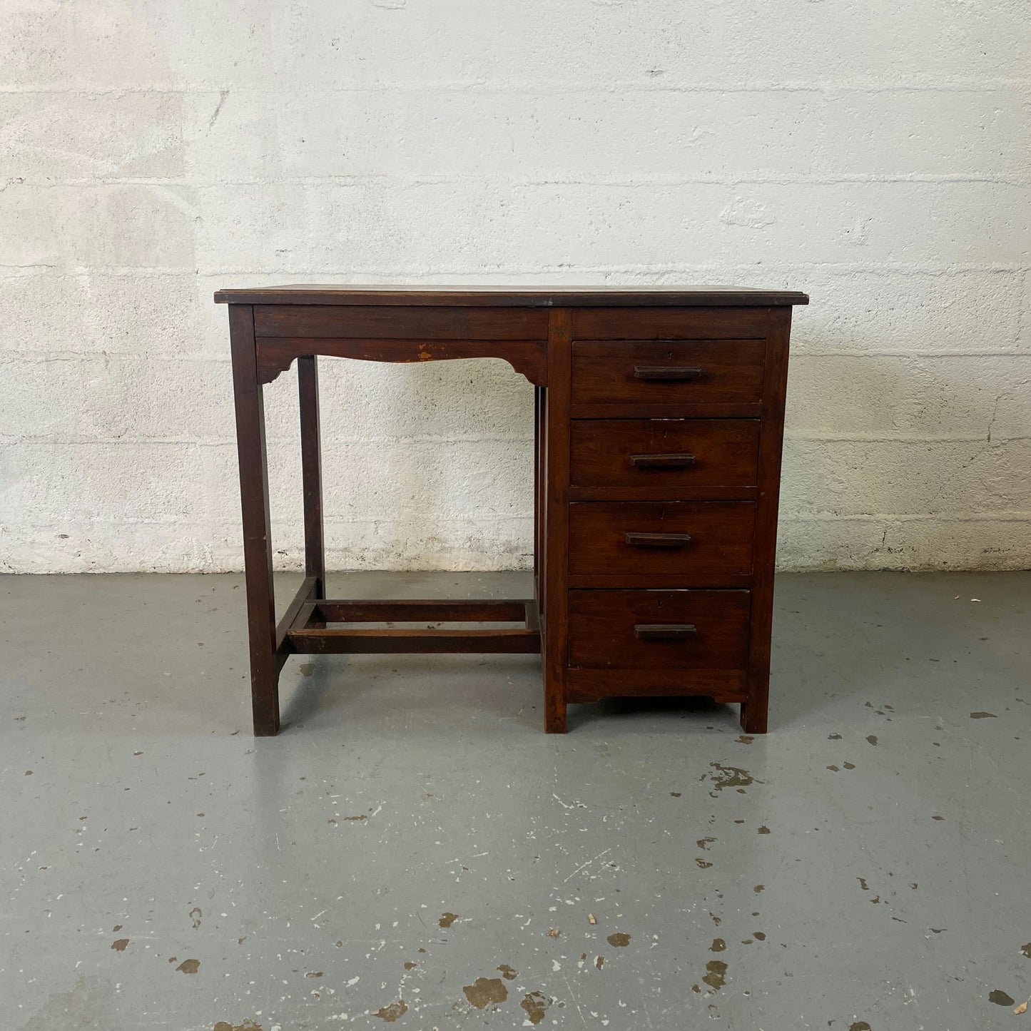 Bureau en bois 4 tiroirs