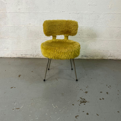 Chaise fourrure doré