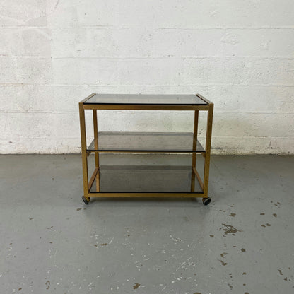 Étagère à roulettes et plateaux en verre