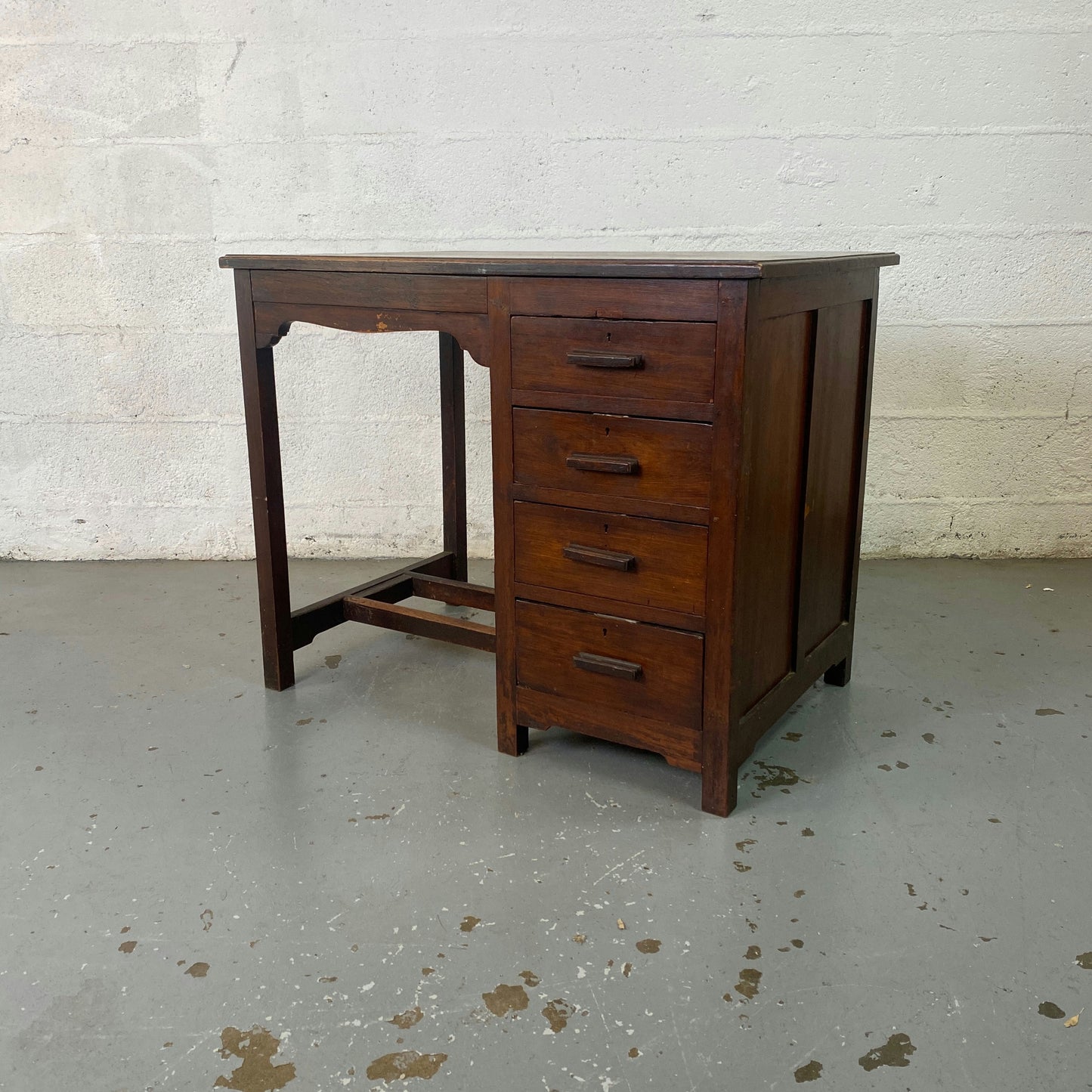 Bureau en bois 4 tiroirs